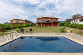 StayVista's Shivom Villa 5 - A Serene Escape with Views of the Valley and Lake